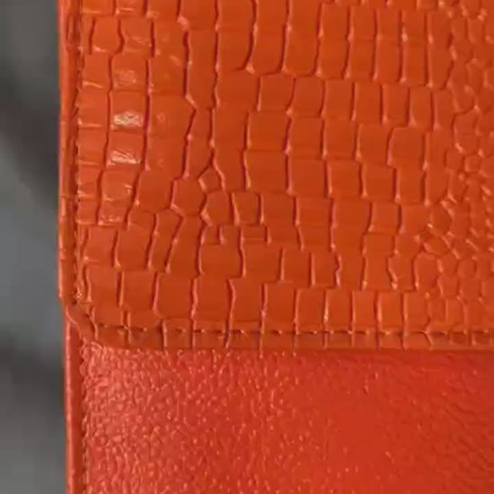 Billetera porta celular Pandora para dama en color naranja